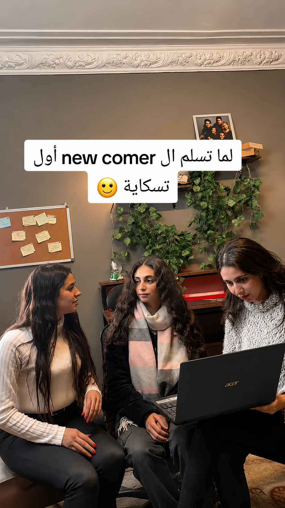 Optiiimum team onboarding a new member with a laptop walkthrough